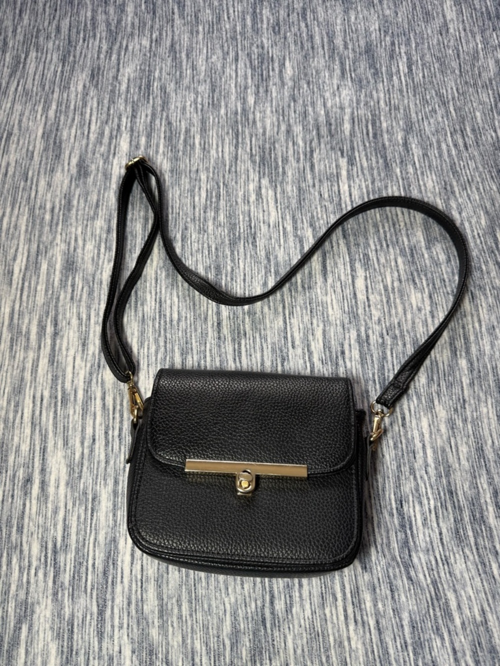 Black Leather Crossbody Bag with Gold Accent